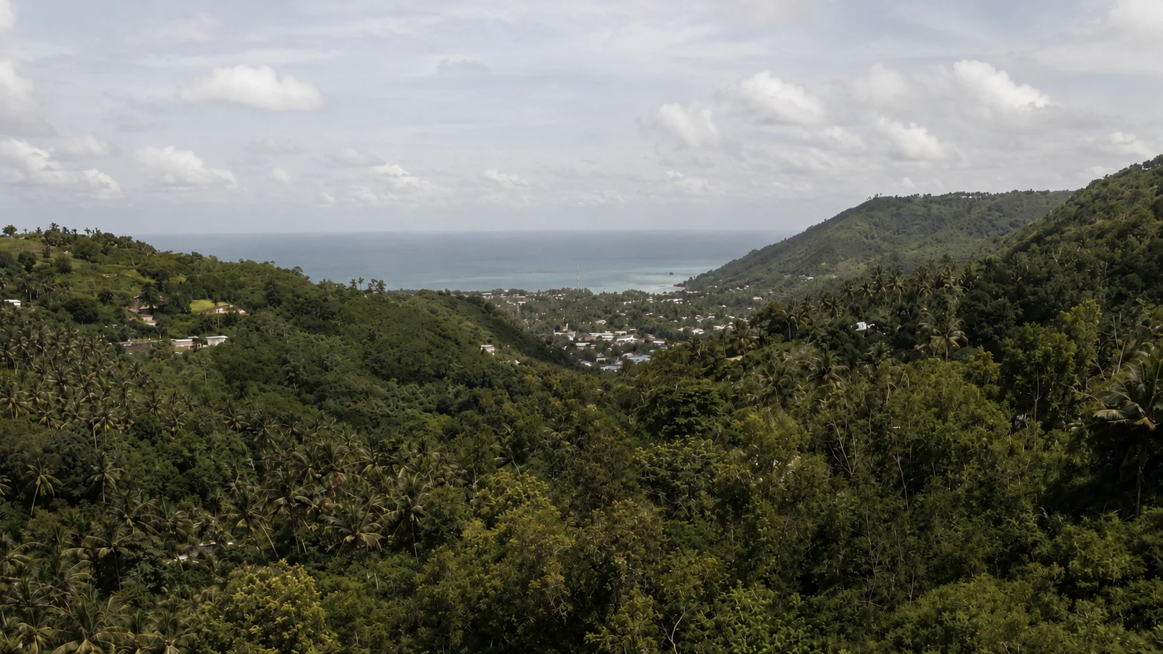 Panoramic hills and ocean horizon from the Konekt Plots site, Kuta Lombok